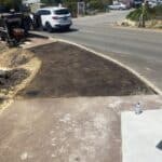 This is a Red Asphalt Patch Repair - Footpath in Byford with preparation complete with tack spray added, Prior to the installation of the red asphalt.