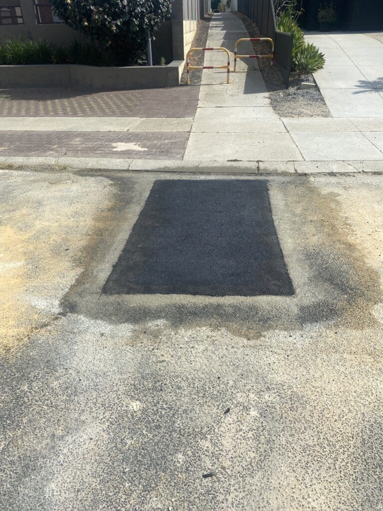 completed emergency asphalt patch repair for water corporation