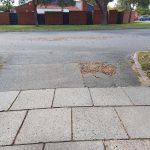 Before image of a asphalt driveway crossover resheet in Como, Western Australia for a private customer.