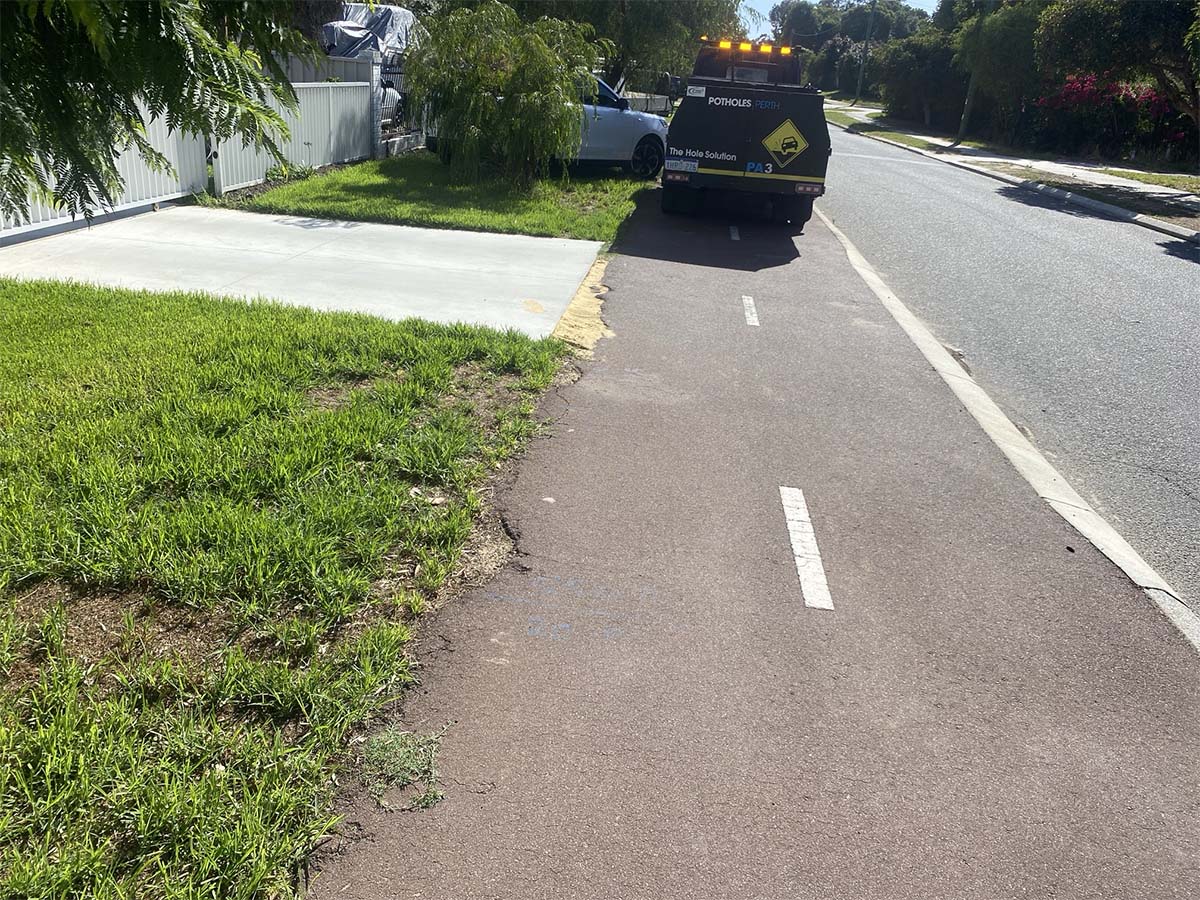 Before image of an asphalt crossover edge repair in Bassendean, Western Australia for a private customer.