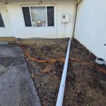 Before image of an asphalt driveway extension in O'Connor, Western Australia for Midolo Building Services.