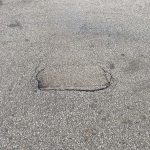 Before image of an asphalt patch repair in Welshpool, Western Australia for Big Yellow Mining Pty Ltd.