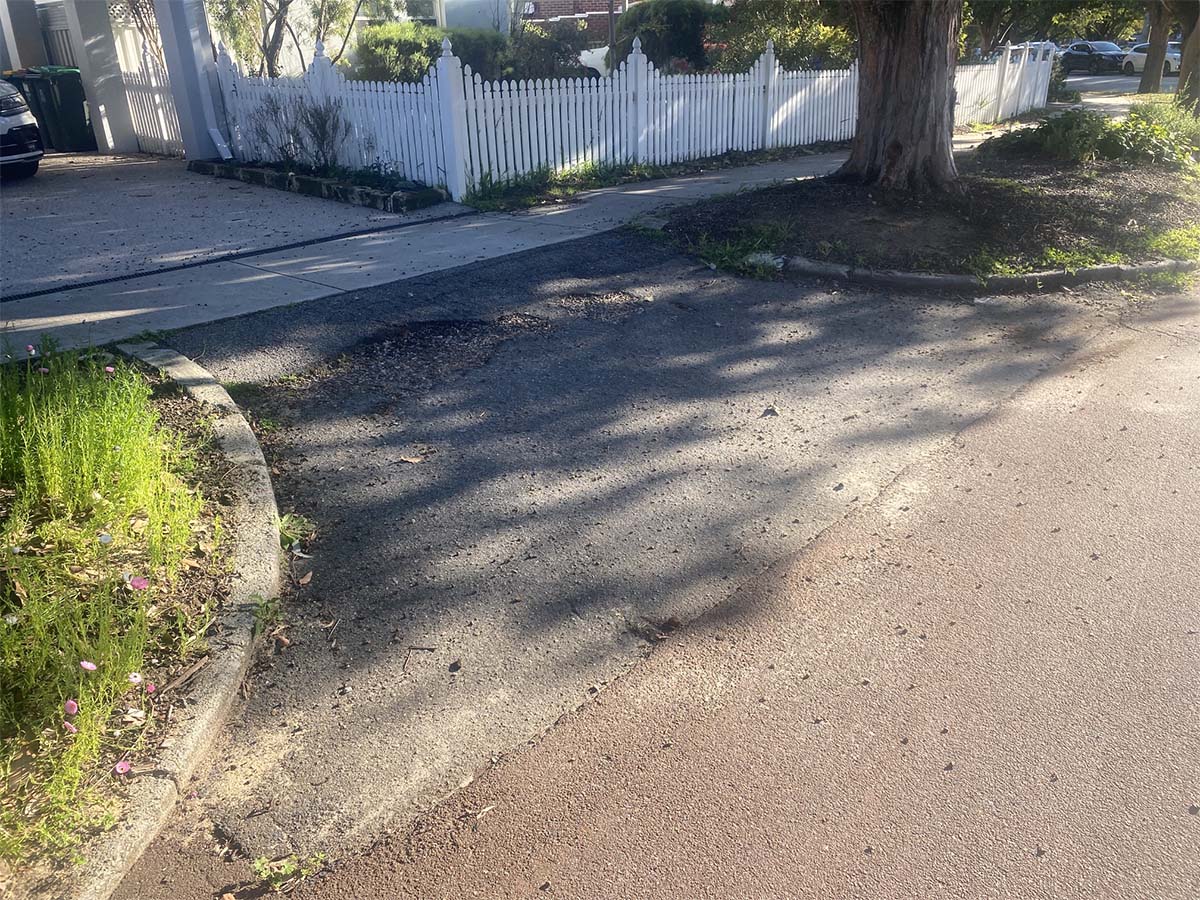 Before image of a asphalt driveway crossover resheet in Daglish, Western Australia for a private customer.